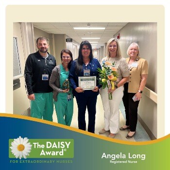 Anna Long receiving DAISY Award