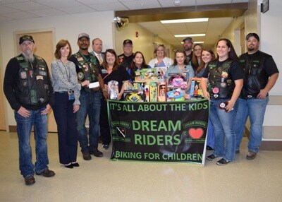 Dream Riders Biking for Children present donation