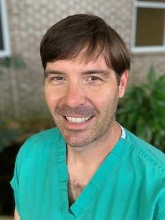 Dr Justin Brewer