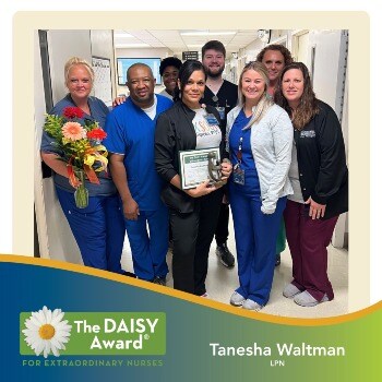 Tanesha Waltman receiving DAISY Award