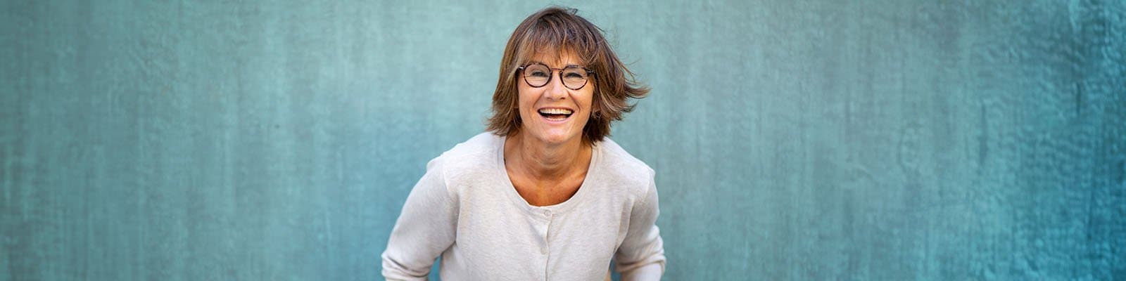 middle-aged woman laughing