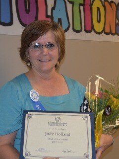 Judy Holland receives award