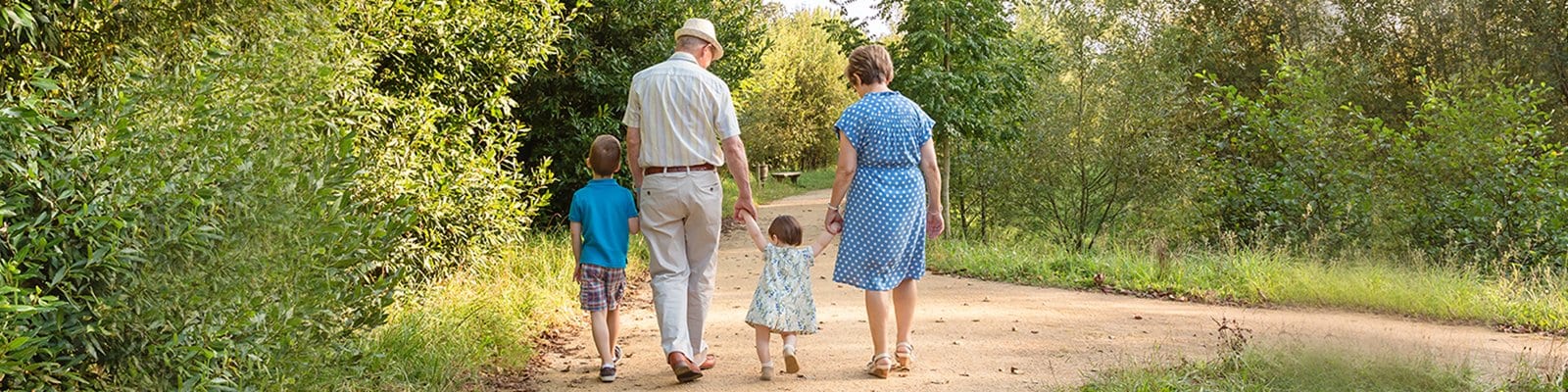 grandparents walking with grandchildren